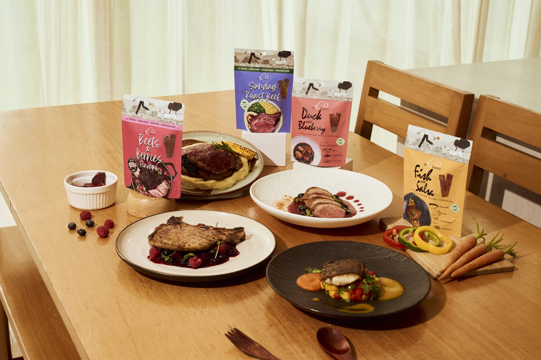 Pawganic dishes and packaging on a dining table